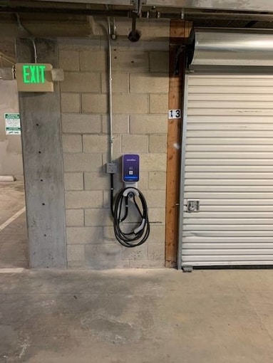 JuiceBox Pro 32 EV charging station installed in apartment building by Jamar Power Systems