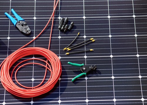 solar repairs - tools on top of pv module